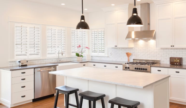 Plantation shutters in a bright Jacksonville kitchen.